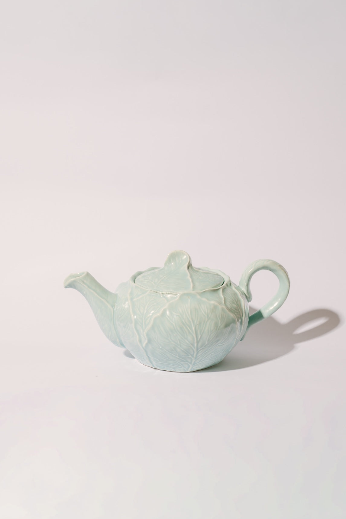 Bule de cerâmica verde agua